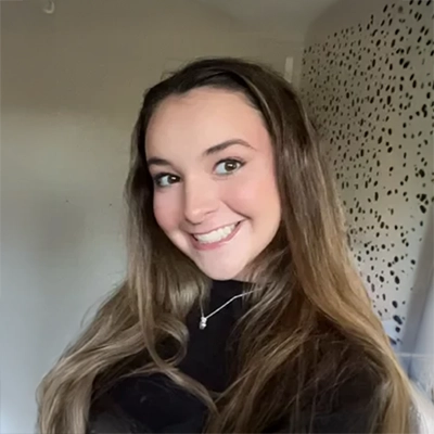 Joslyn Talbert smiling in a black shirt.