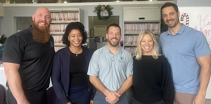 Eric DiMartino Steven Light Josh Papineau Amber Williams and Janet Bednarz Pose For a Group Photo